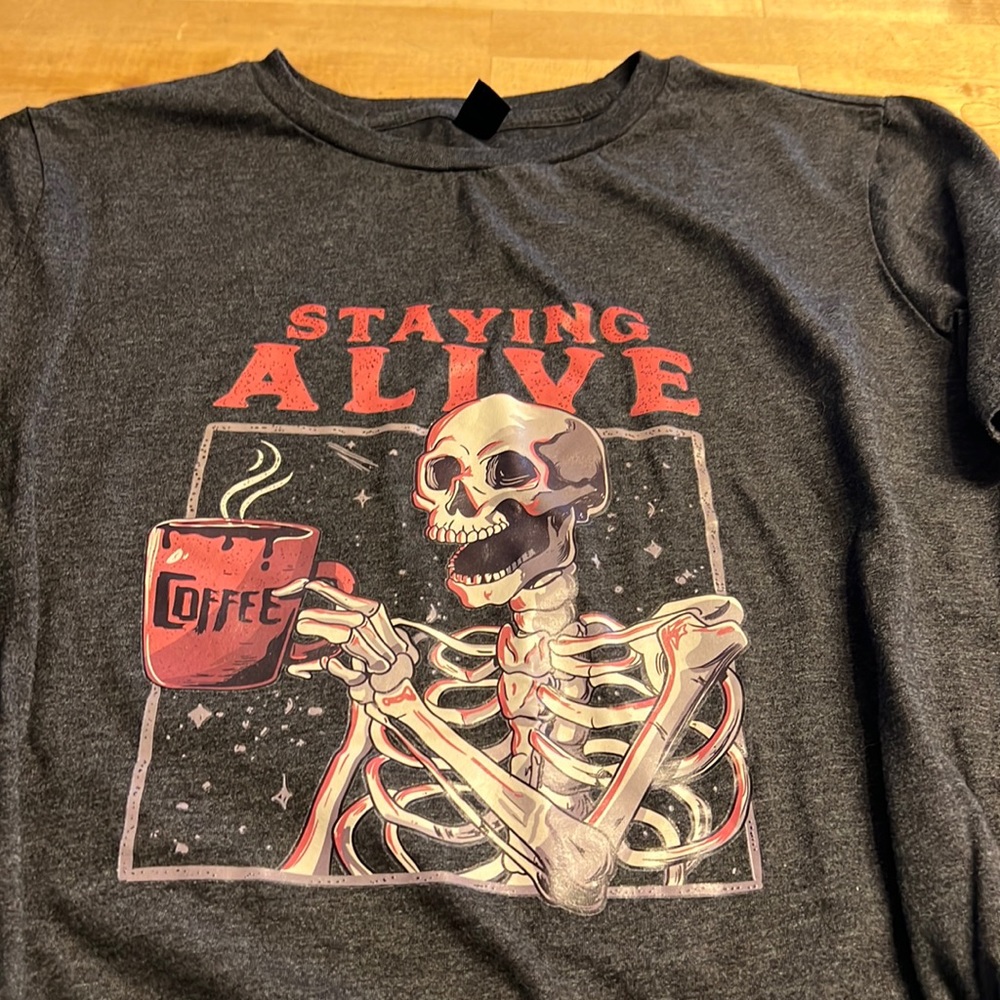 Shein curve 0XL graphic tee “staying alive” fits more like a medium